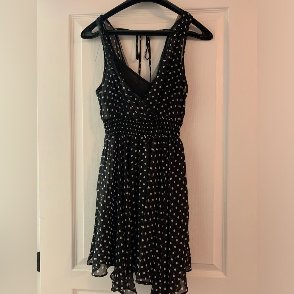 Black dress with white polka dots